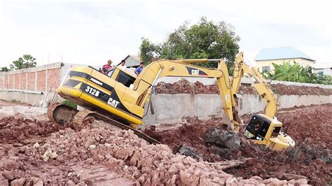 mini excavator stuck|heavy construction equipment getting stuck.